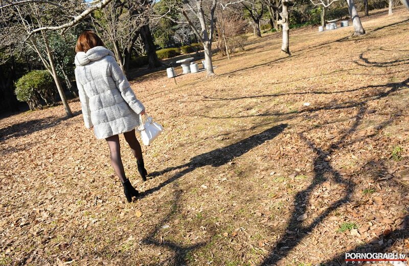 Woman walking in a park