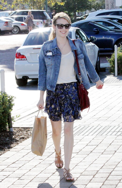 Woman walking in a parking lot