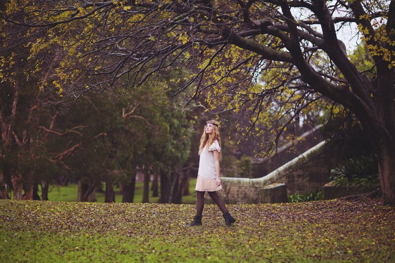 Woman walking in autumn park