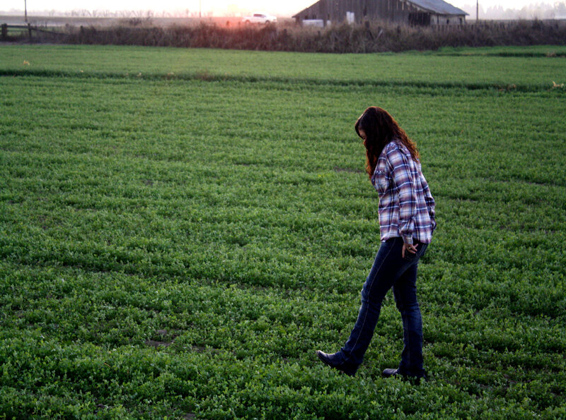 Woman Walking in Field — Green, Serene