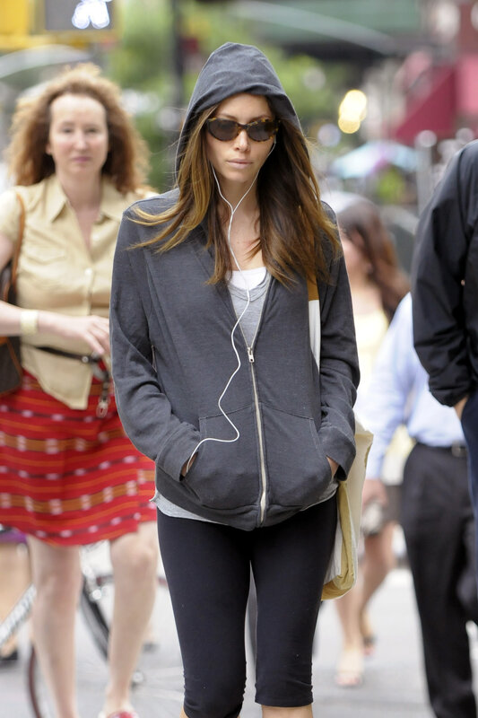 Woman walking in hoodie