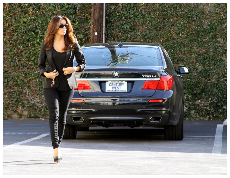 Woman Walking in Parking Lot — Black