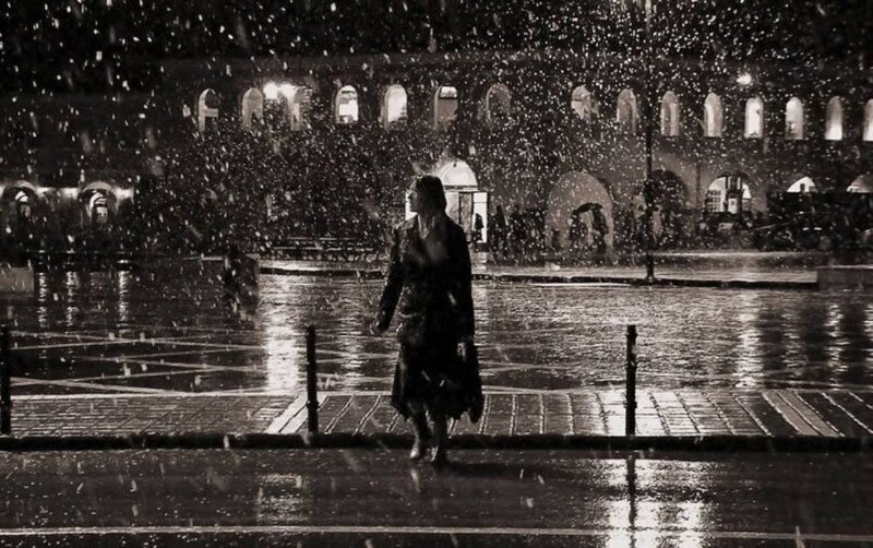 Woman Walking in Rain — Black
