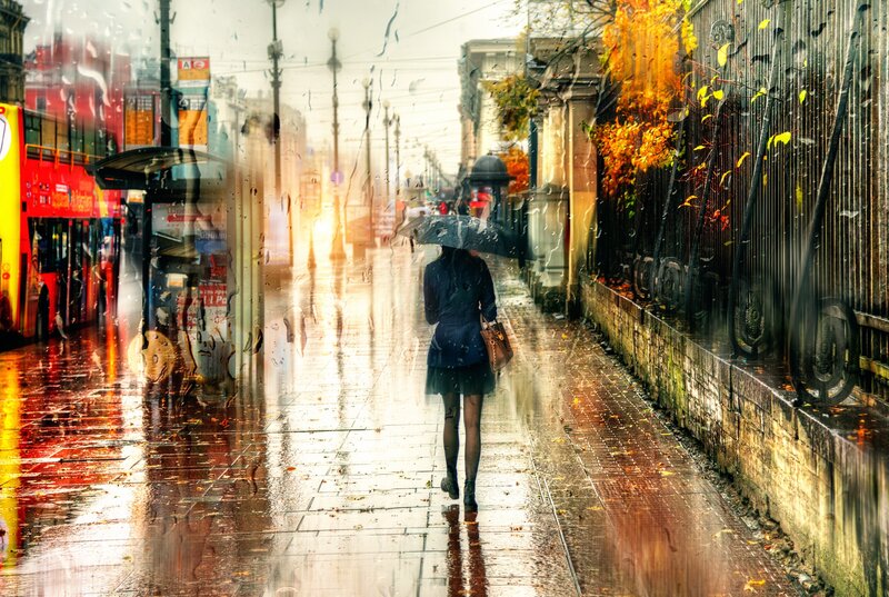 Woman Walking in Rain — Yellow