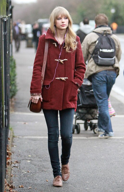 woman walking in red coat