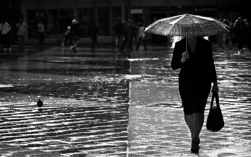Woman walking in the rain
