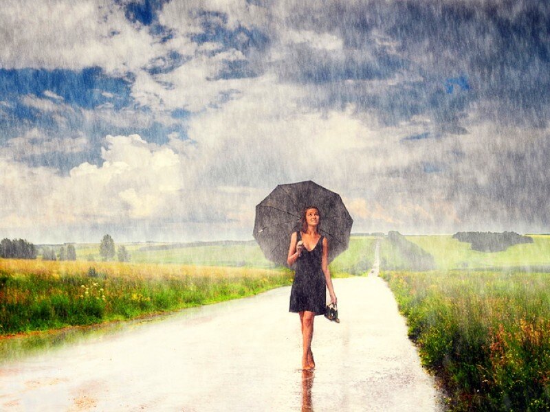Woman walking in the rain