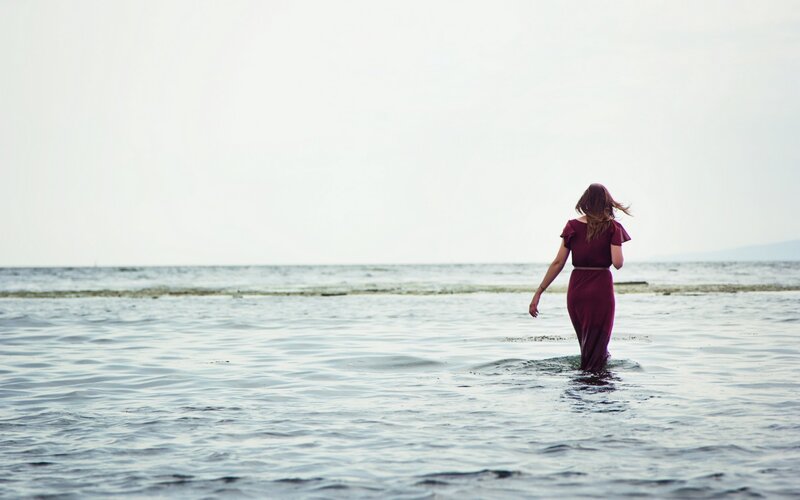 woman walking in the sea