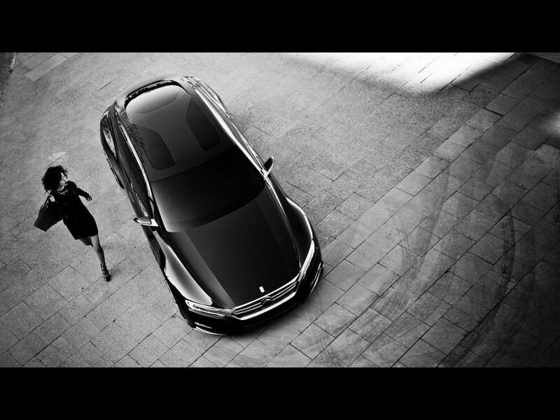 woman walking near car