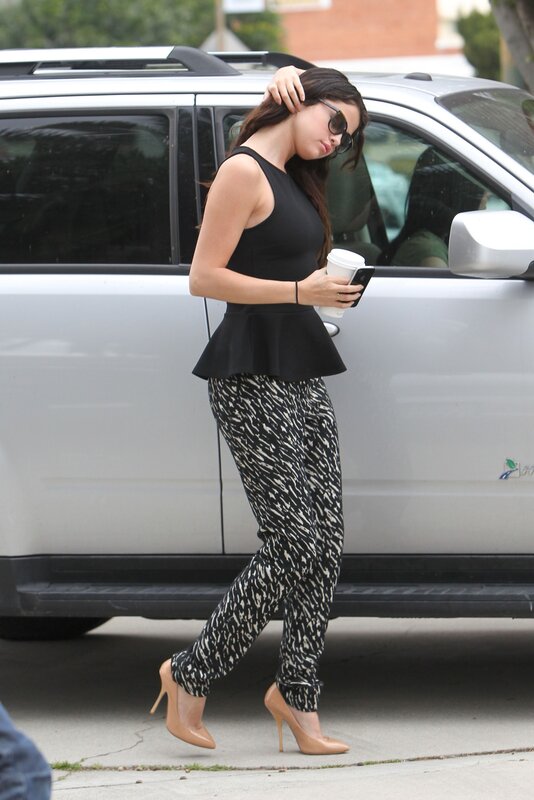 Woman walking near car