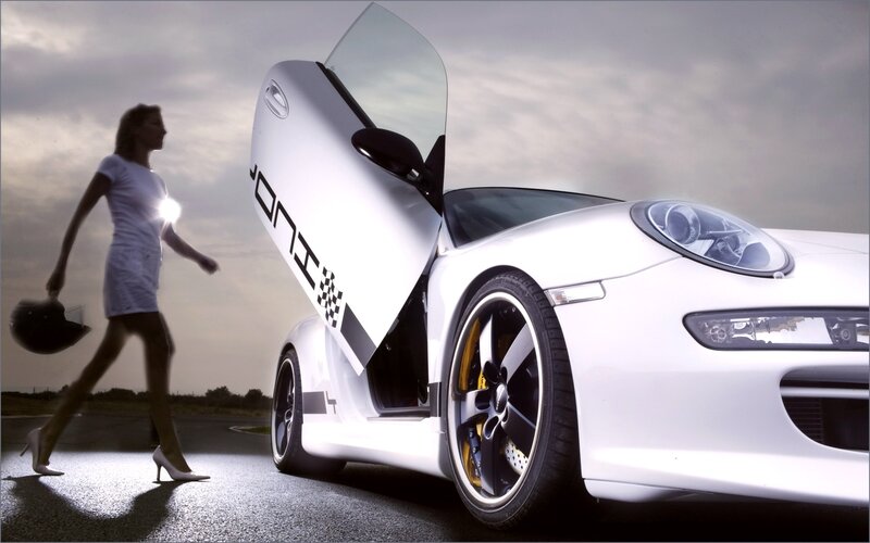 Woman Walking Near Car — White, Dramatic
