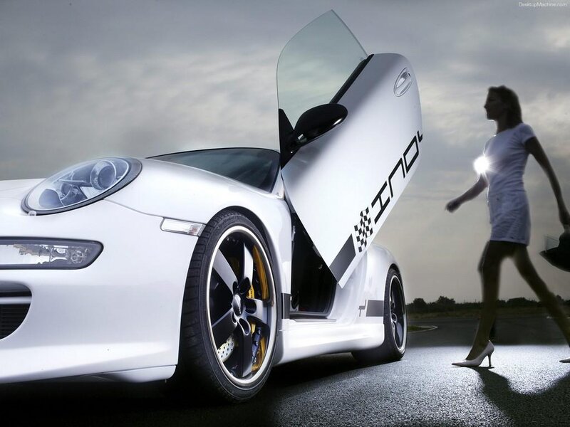 woman walking near white sports car