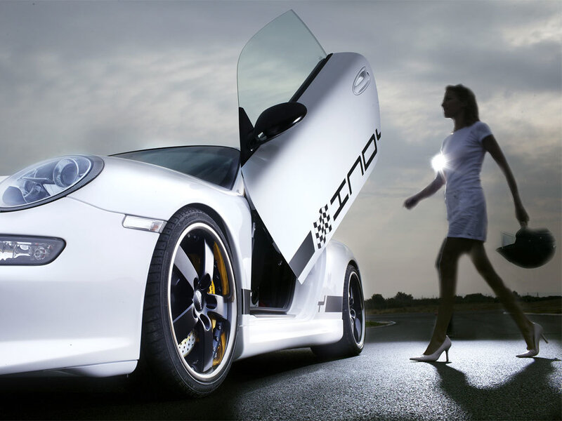 woman walking near white sports car
