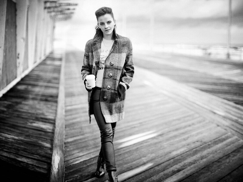 woman walking on a boardwalk