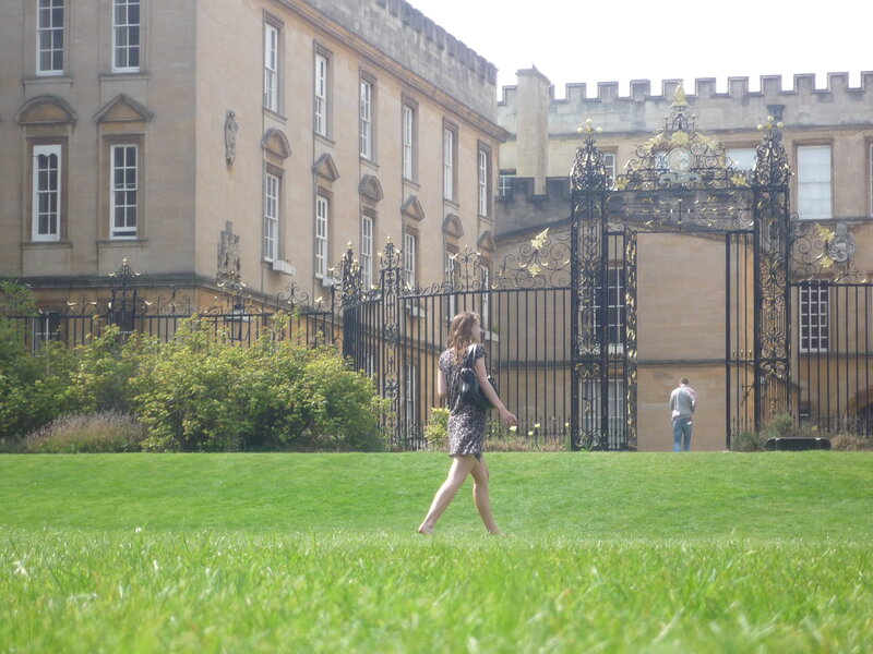Woman walking on a lawn