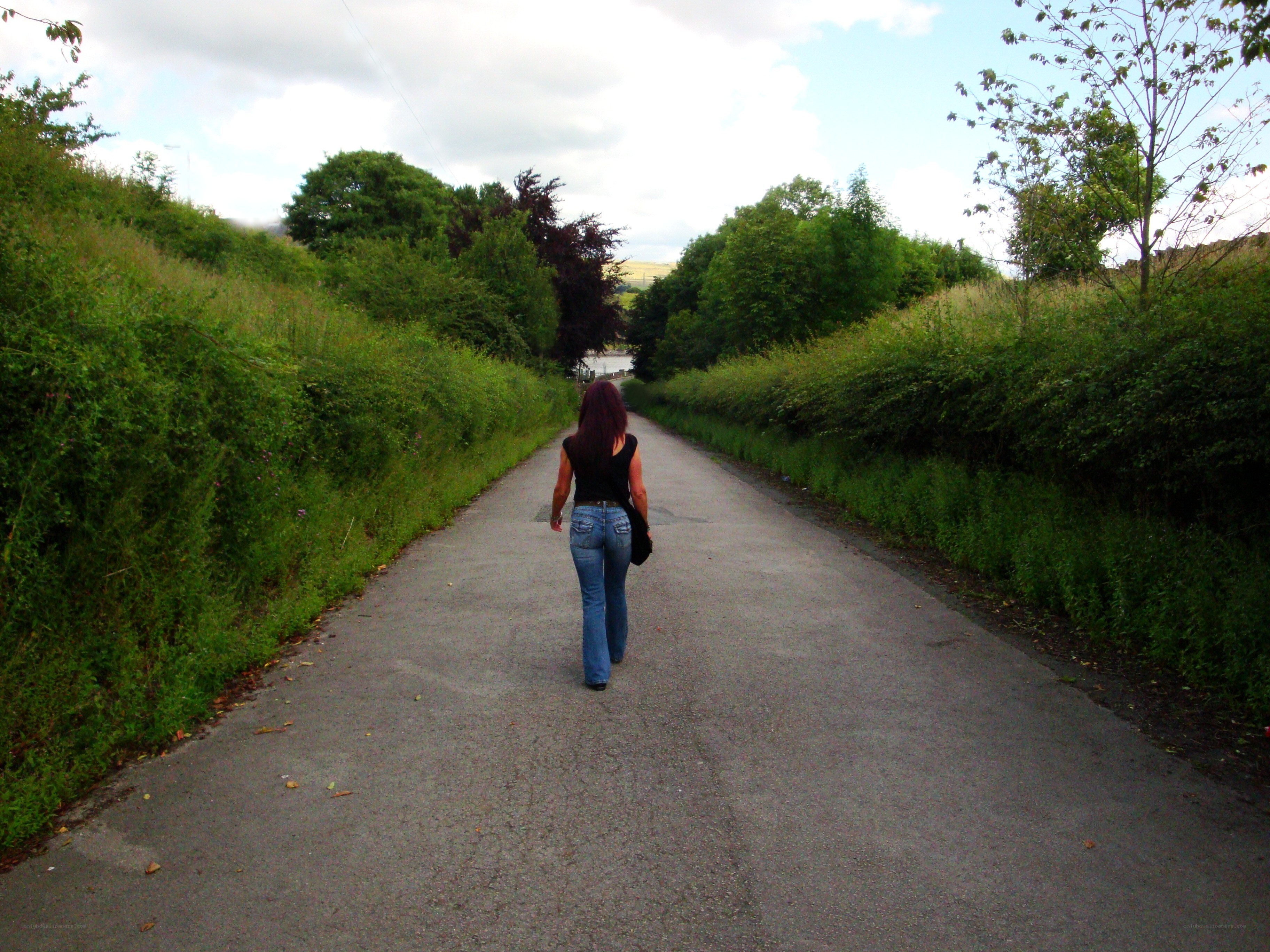 woman walking on a path