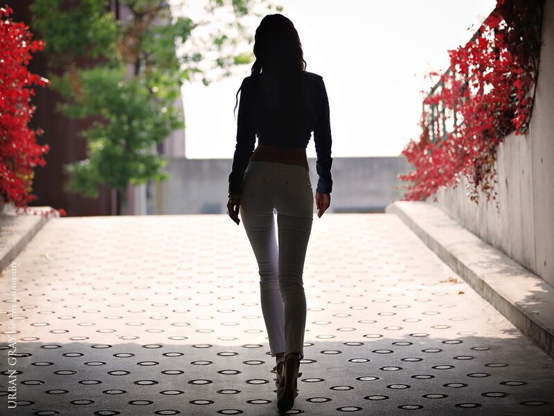 Woman walking on a patterned path