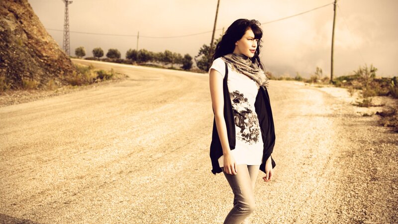 woman walking on a rural road
