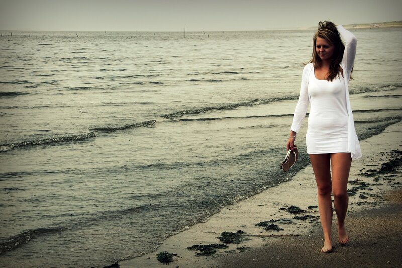 Woman walking on beach