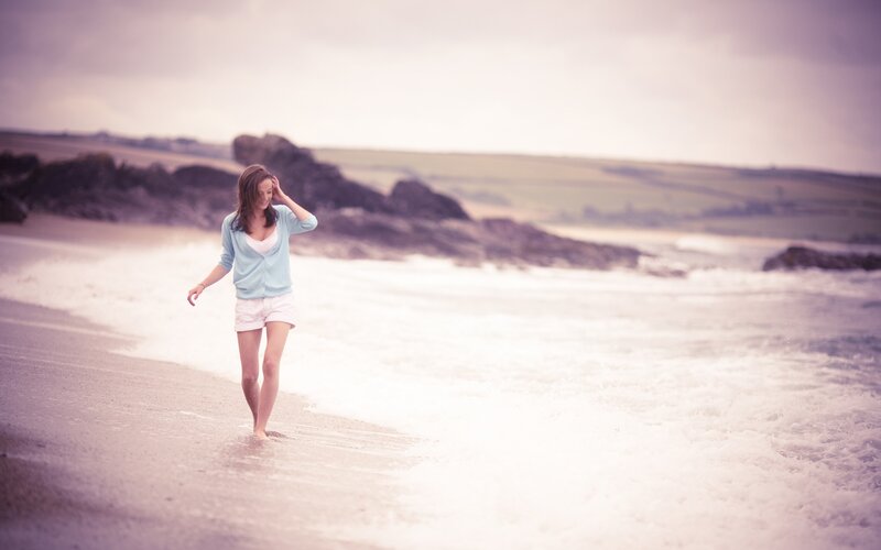 woman walking on beach