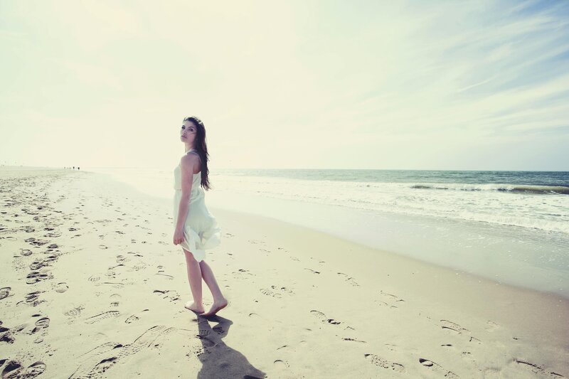 woman walking on beach
