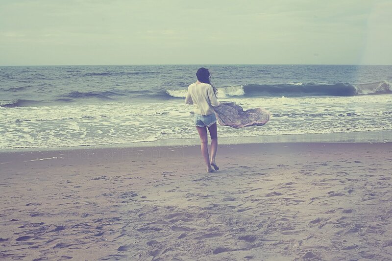 woman walking on beach