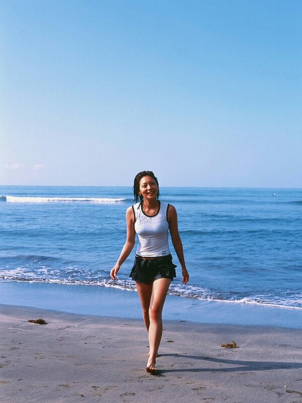 Woman Walking on Beach — Blue, Serene, Afternoon, Photograph, Ocean