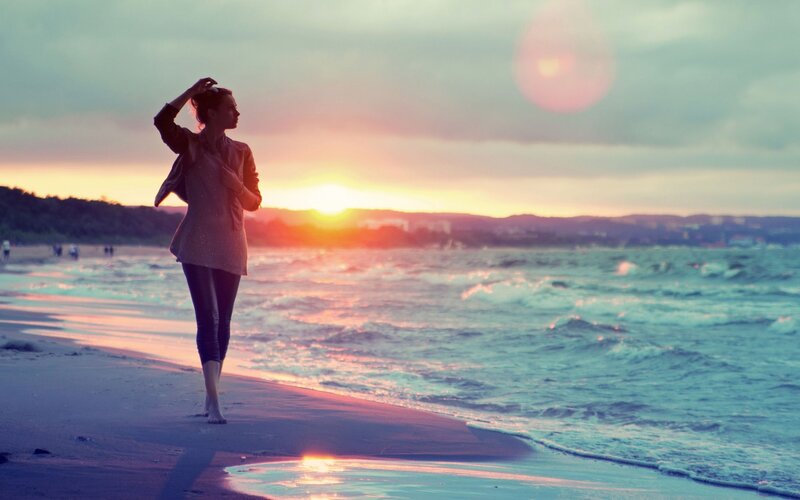 Woman Walking on Beach — Blue, Serene, Sunset