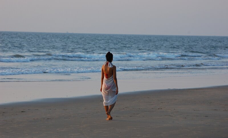 Woman Walking on Beach — Blue, Serene