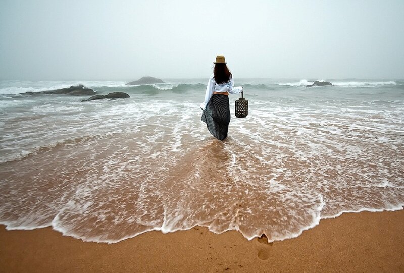Woman Walking on Beach — Brown