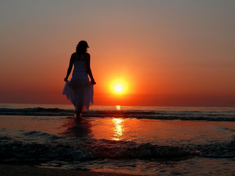 Woman Walking on Beach — Orange