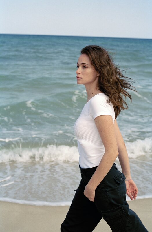 Woman Walking on Beach — White, Calm