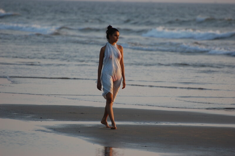 Woman Walking on Beach — White, Serene