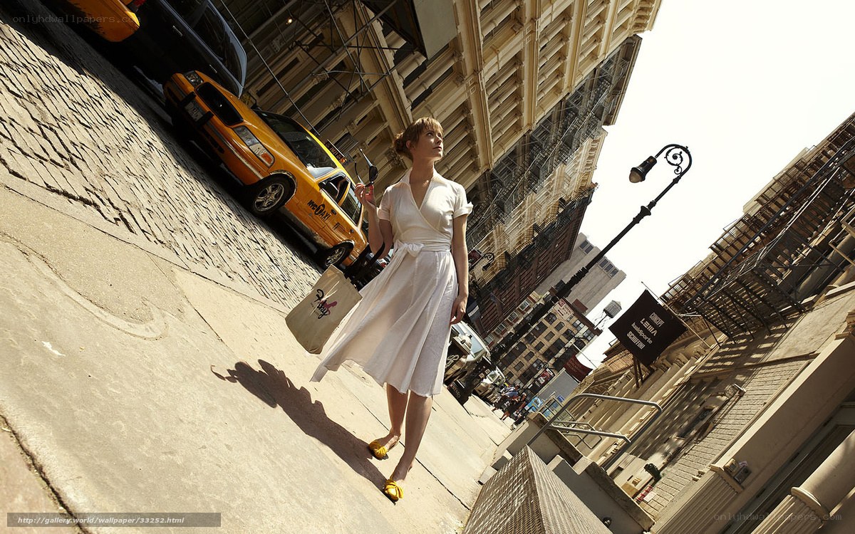 Woman walking on city street