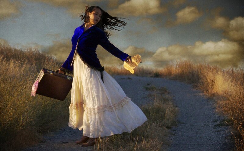 Woman Walking on Dirt Path