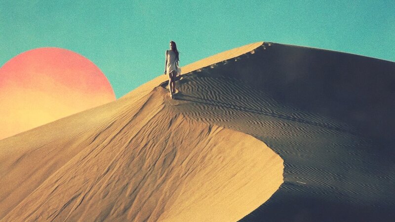 Woman Walking on Dune