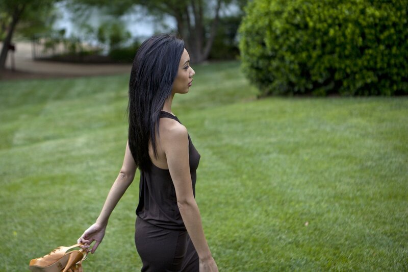 woman walking on grass