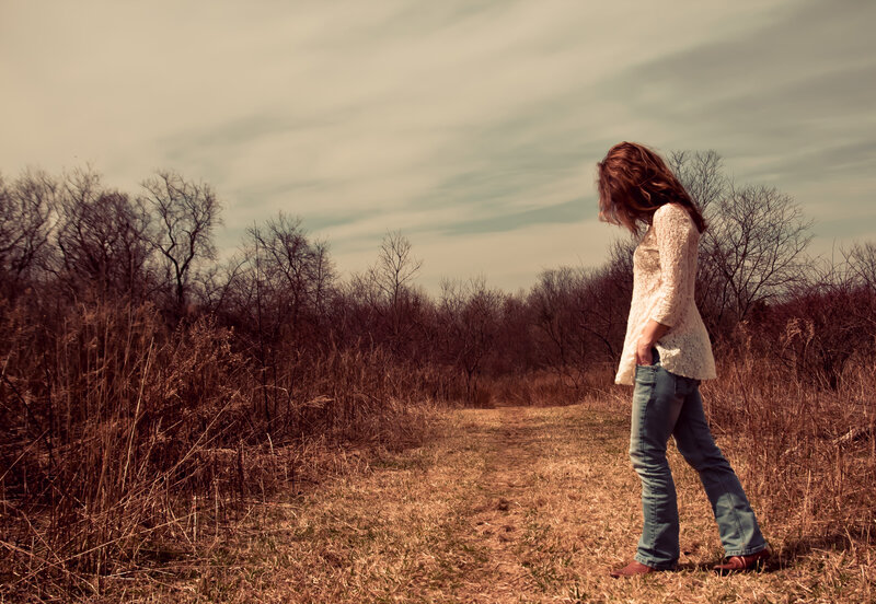 Woman Walking on Path — Brown, Contemplative
