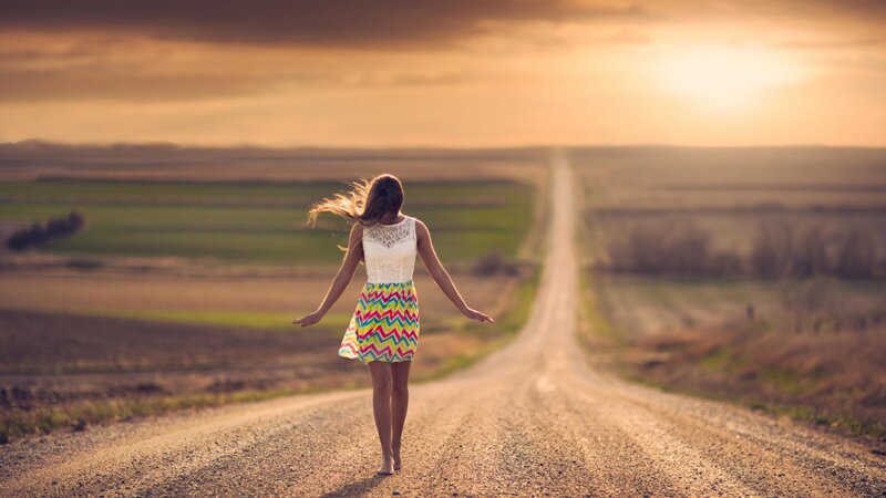 Woman Walking on Road — Brown