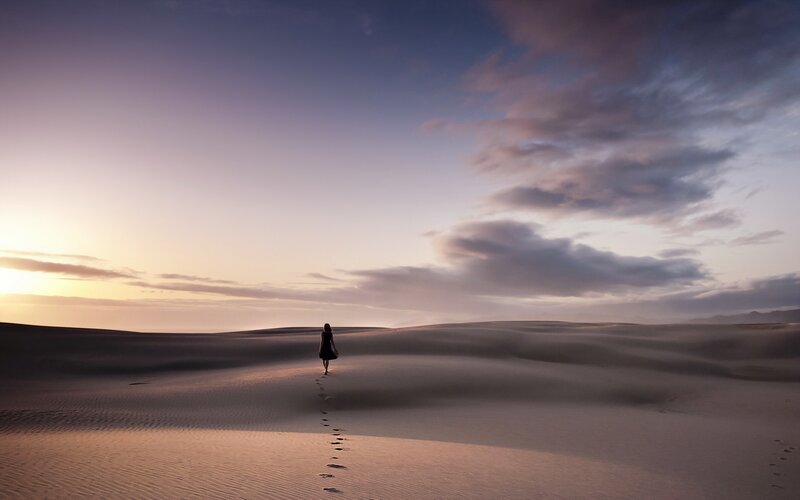 Woman Walking on Sand Dunes — Purple