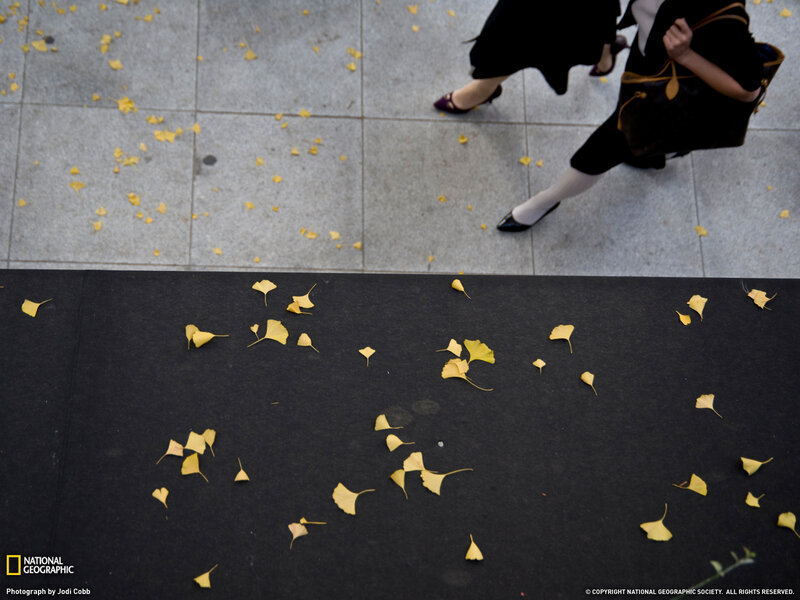 Woman Walking on Sidewalk — Black