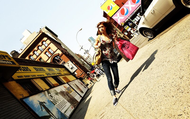 Woman Walking on Sidewalk — Yellow