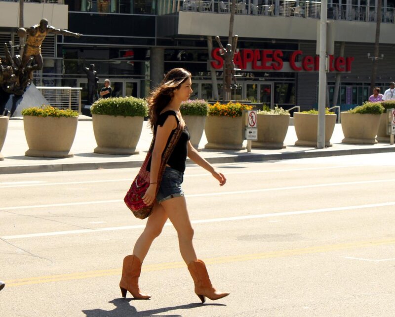 Woman Walking on Street — Brown