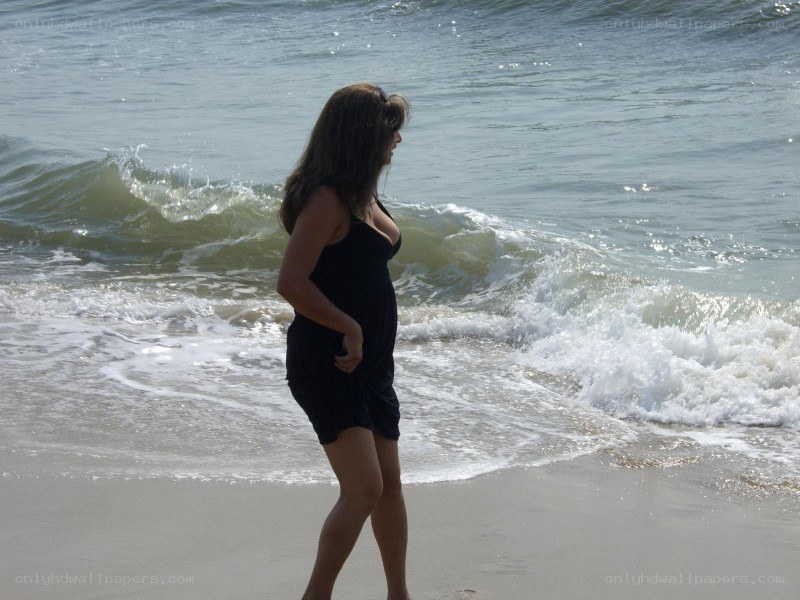 Woman walking on the beach