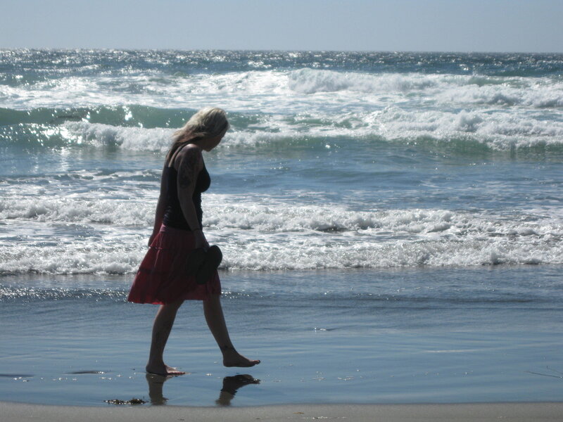 Woman walking on the beach