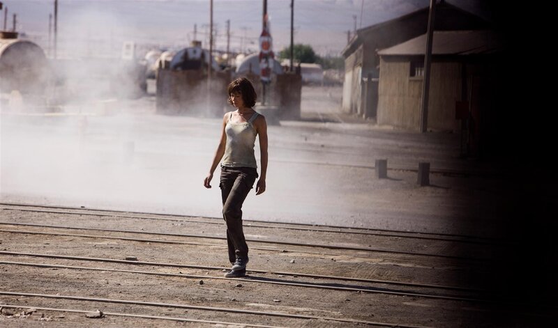 Woman Walking on Tracks — Brown