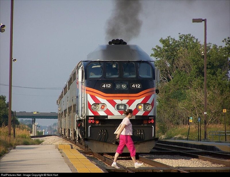 Woman Walking on Tracks