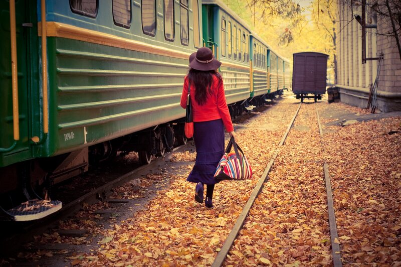 Woman Walking on Train Tracks — Green, Calm