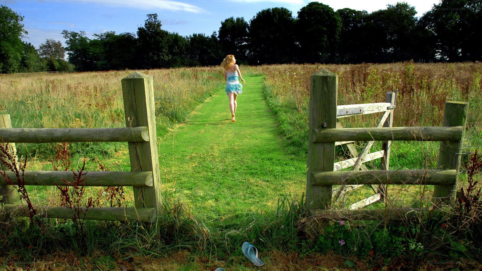 Woman walking through a field
