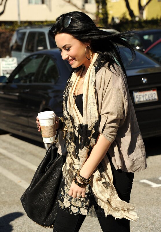 Woman walking with coffee